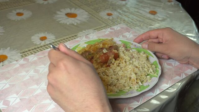 close-up of a person eating lima beans stew. typical peruvian food at home