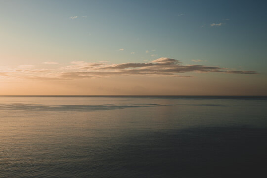 sunset over the ocean © luca