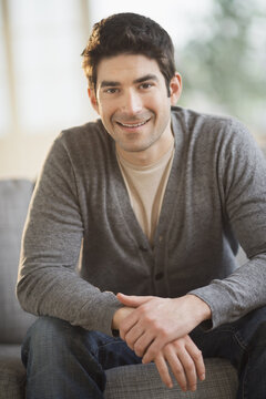 Portrait of mid adult man at home