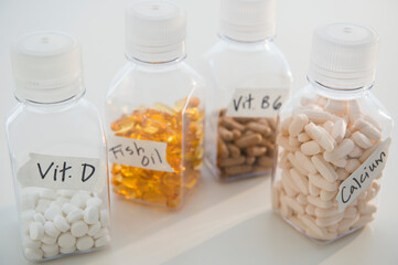 Studio shot of various pills in bottles