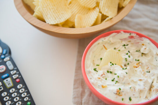 Studio shot of crisps and onion dip