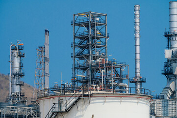 Industrial zone,The equipment of oil refining,Close-up of industrial pipelines of an oil-refinery plant,Detail of oil pipeline with valves in large oil refinery.