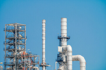 Industrial zone,The equipment of oil refining,Close-up of industrial pipelines of an oil-refinery plant,Detail of oil pipeline with valves in large oil refinery.