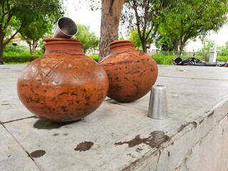 clay pots filled with cool water in summer in India