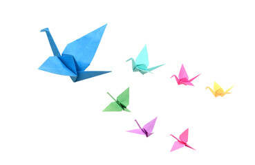Origami birds flying on white background