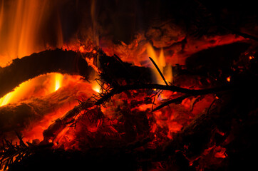 embers burn down in a hardwood fire