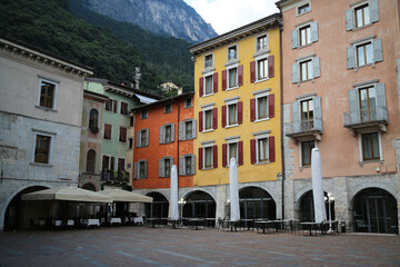 Fototapeta na wymiar Ancient colored palaces of the city of Riva Del Garda