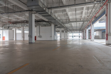 Large concrete warehouse indoor space