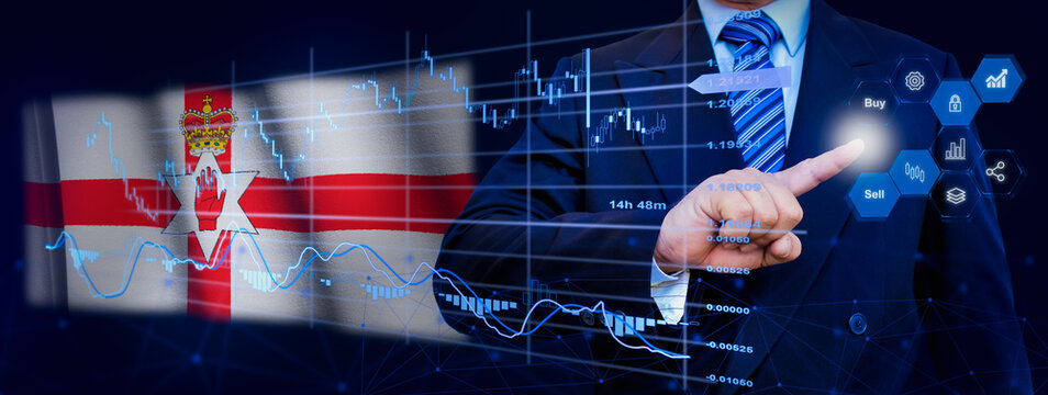 Businessman touching data analytics process system with KPI financial charts, dashboard of stock and marketing on virtual interface. With Northern Ireland flag in background.