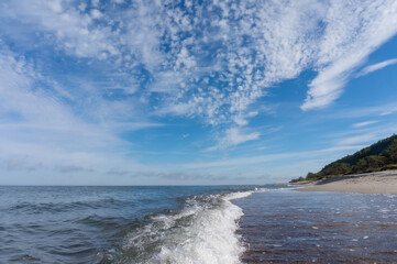 Sea coast. Tides and storms at sea. Waves on the Baltic Sea. Deserted seashore.