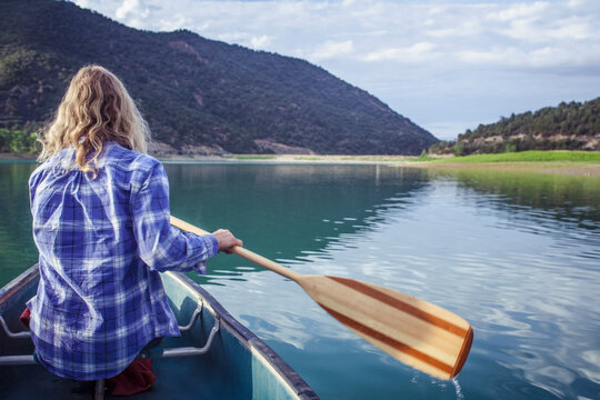 Woman canoeing in lake