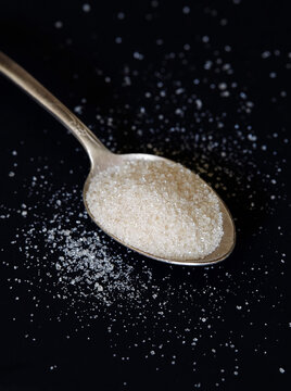 Brown sugar on spoon