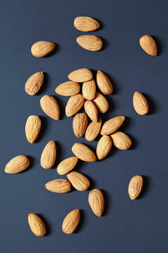 Almonds on black background