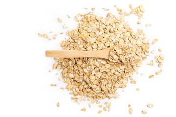 Wooden spoon and oat flakes isolated on a white background.