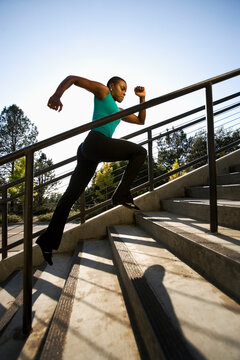Woman running on steps