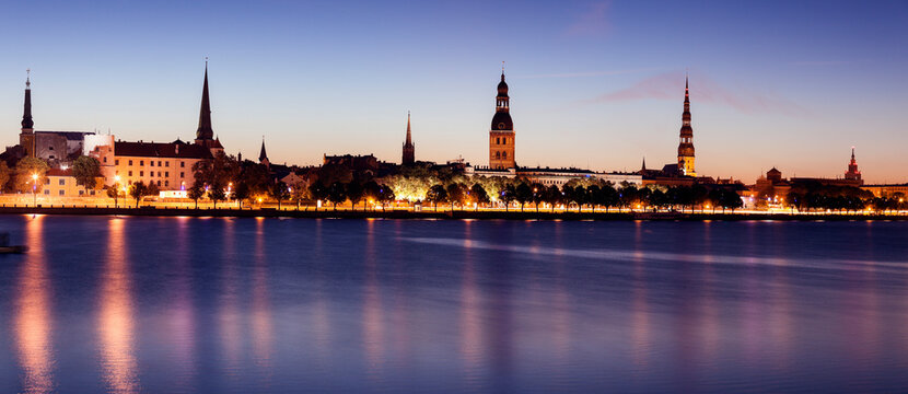 City reflecting in River Daugava