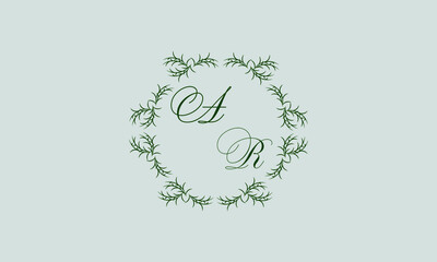 Decorative botanical logo with one or two letters. Elegant floral monogram for wedding, invitation, label, business.