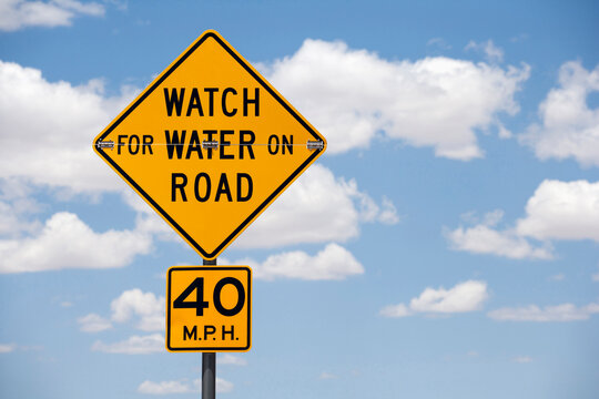Naklejki Road sign against cloudy sky