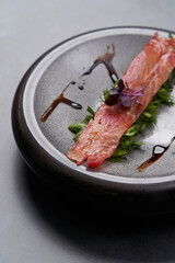 Hot smoked salmon with dill leaves. Homemade hot smoked salmon fillet