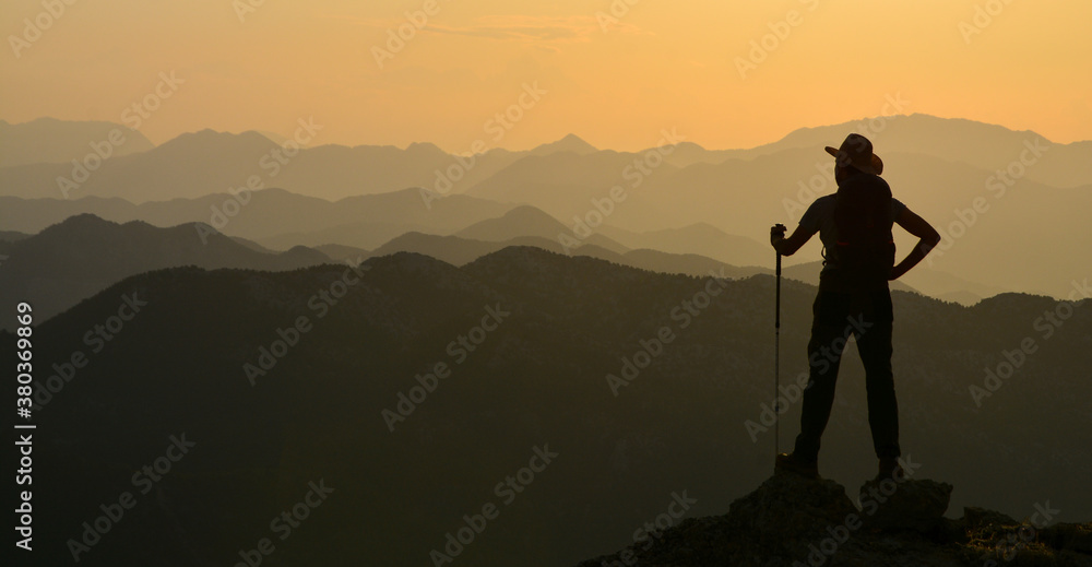 Wall mural to be in high mountains at sunset