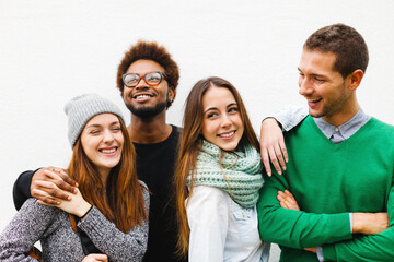Portrait of group of young friends on white background.