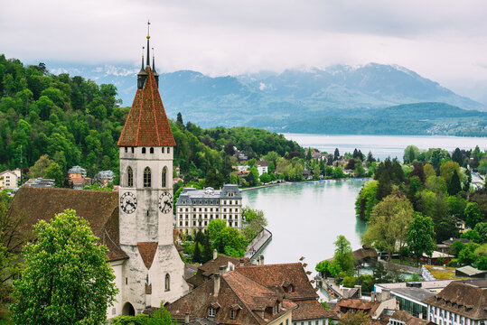 City of Thun with church tower and lake Thun, Switzerland