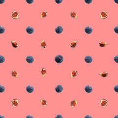 pattern of fresh figs on pastel red background