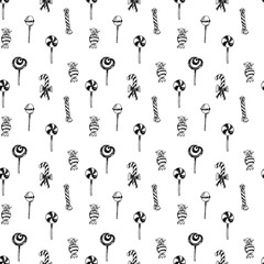 Hand drawn doodle seamless pattern with christmas candy and lollipops