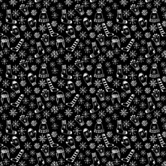 Hand drawn doodle drawings seamless pattern with candy, snowflakes, socks, presents.