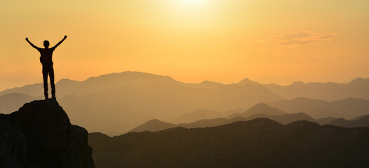 Achieving his goal, reaching his goal mountaineer, determined mountaineer