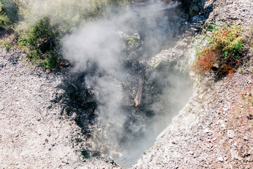 Geothermal hole with rising steam