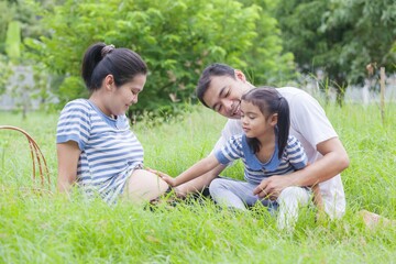 Happy young family spending time at outdoor on a day