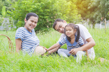Happy young family spending time at outdoor on a day