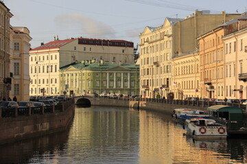 Canals of Saint-Petersburg - buildings and reflections in sunny morning