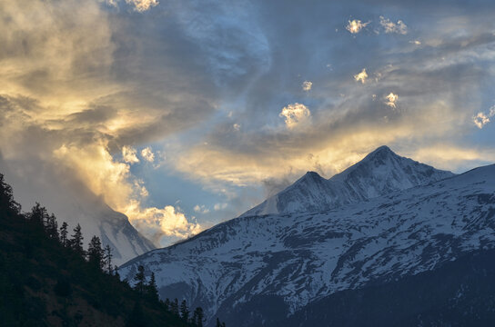 Stunning sunset in snowy mountains
