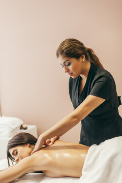 Woman Enjoying a Back Massage