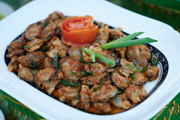 Grilled Mussels with Spicy seasoning. Indonesian Traditional seafood menu