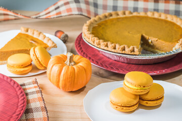 High Angle of Pumpkin Pie and Food on a Thanksgiving Table