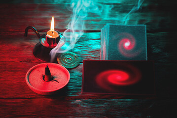 Tarot cards deck on the old table background.