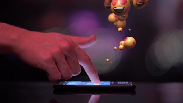Playing with Mobile Phone on Instagram Facebook Reacting Emoji-Smiling Face with Heart-Eyes