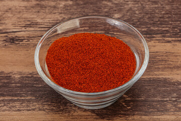 Dry paprika powder in the bowl