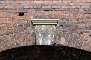 Old Weathered Brick Arch & Wall with Close Up of Keystone