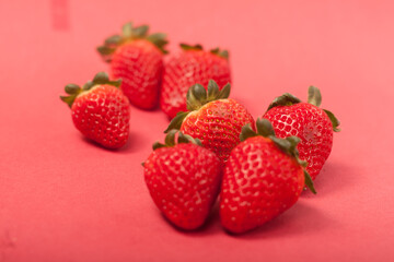 strawberries on a red background