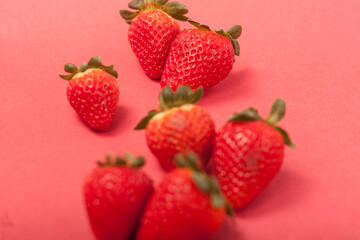 strawberries on a red background