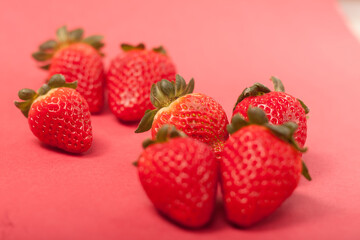 strawberries on a red background