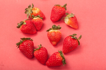 strawberries on a red background