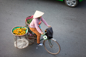 HANOI, VIETNAM - FEB 21: A small market for vendor in early morning in Hanoi, Vietnam on February...