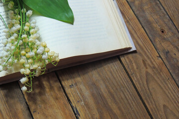 book and lily of the valley
