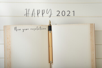 New year Concept - 2021 number and text on notepad