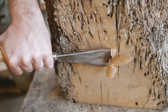 Woodworker using chisel